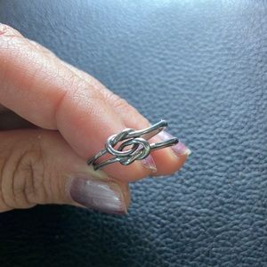 Stainless steel double knot ring.